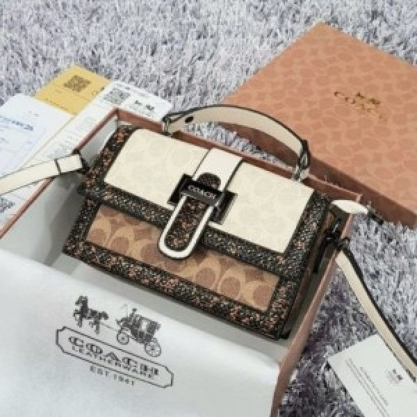 CH studded flap sling bag with box