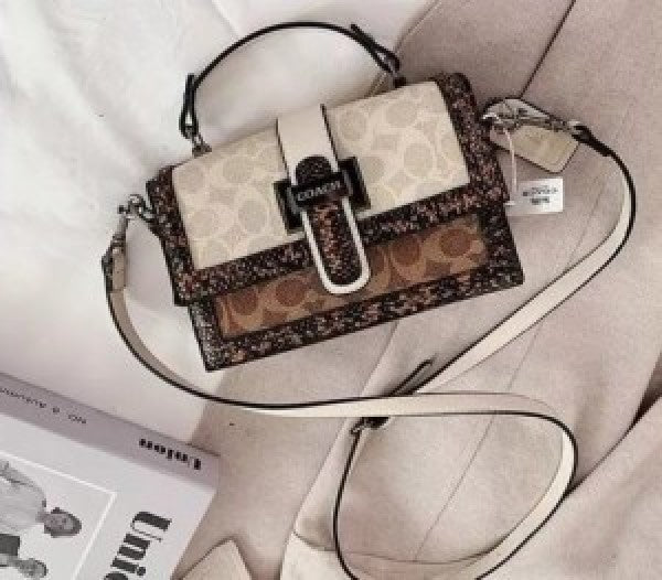CH studded flap sling bag with box