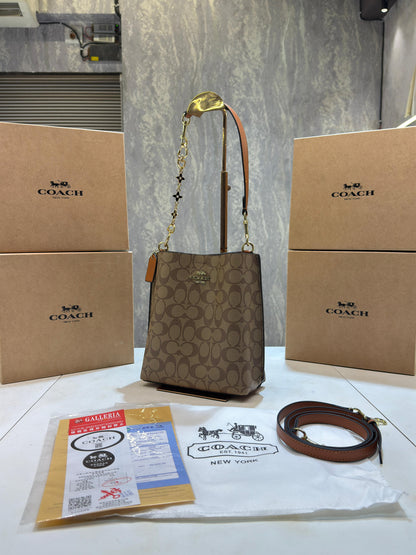 CH mollie signature bucket bag with extra long sling and carry bag