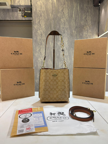 CH mollie signature bucket bag with extra long sling and carry bag