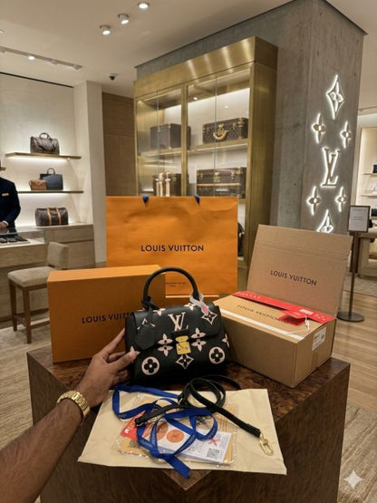 LV madeleine handbag with packing box