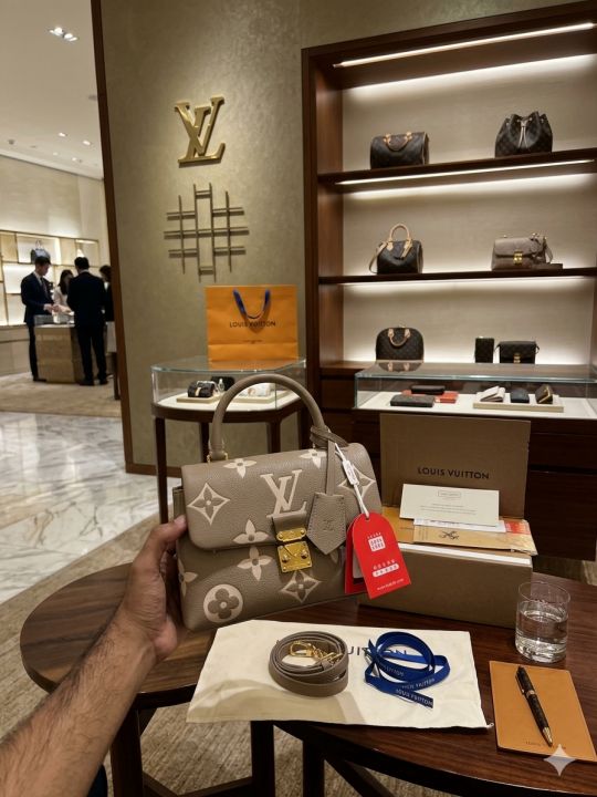 LV madeleine handbag with packing box